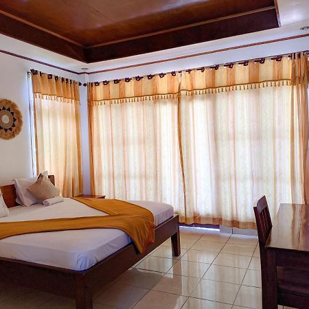 Anda Beach Hotel Bira Exterior foto