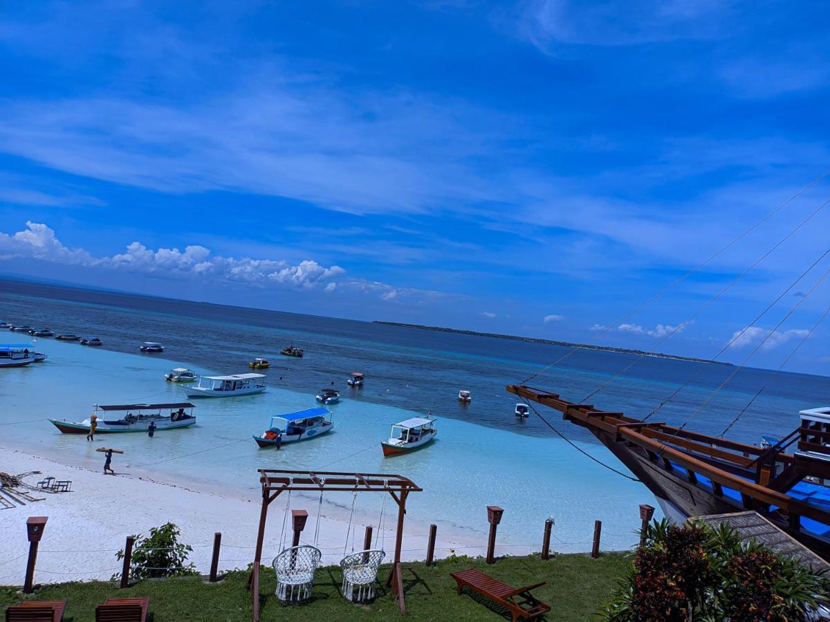 Anda Beach Hotel Bira Exterior foto